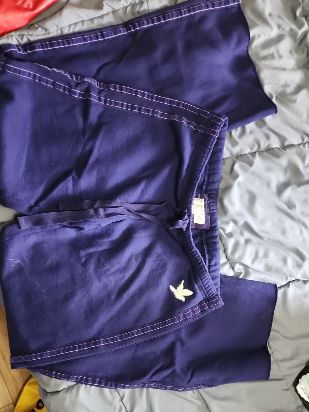 Aeries Purple Wide Leg Sweatpants with Embroidered Bird Accent And Velvet Strip